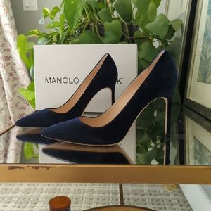 Navy blue suede pumps